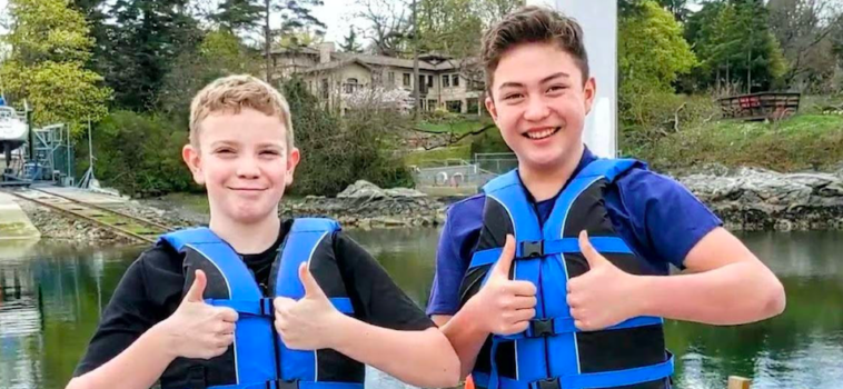 Liam Pope-Lau and Fraser Tuck wearing their invention.