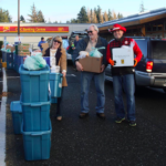 Janice Leffler and Doug Strand taking out a couple of Hampers.
