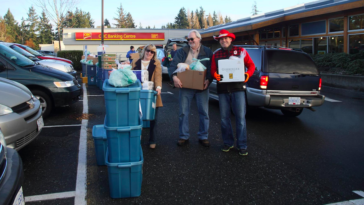 Janice Leffler and Doug Strand taking out a couple of Hampers.