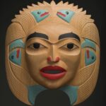 Dale Campbell's "Woman who Brought the Salmon" mask made of alder, abalone and pigment